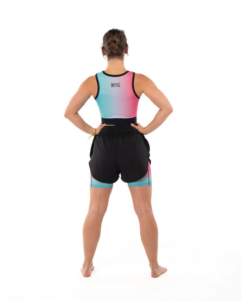 Rear view of the Metal Boxing Miami Vibe women's compression tank top with full back coverage