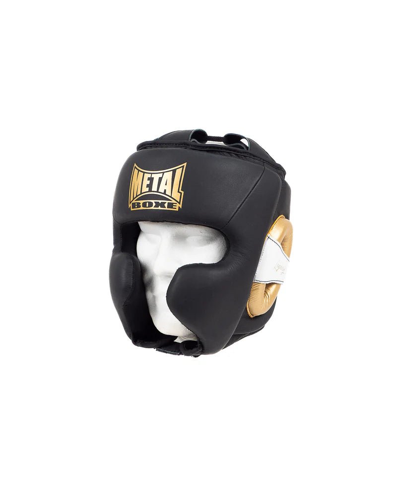 Vedere frontală a căștii Metal Boxing Legacy din piele neagră și aurie, design profesional