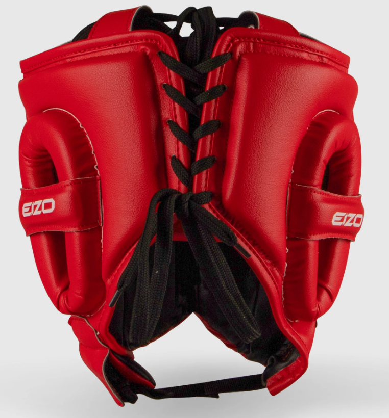 caschetto con parazigomi da allenamento rosso.Estremamente protettivo con imbottiture stratificate.Chiusura con clip e regolazione con lacci sul retro