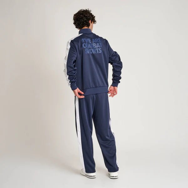 Conjunto de treino técnico Leone para homem com jaqueta de gola alta e calças esportivas retrô
