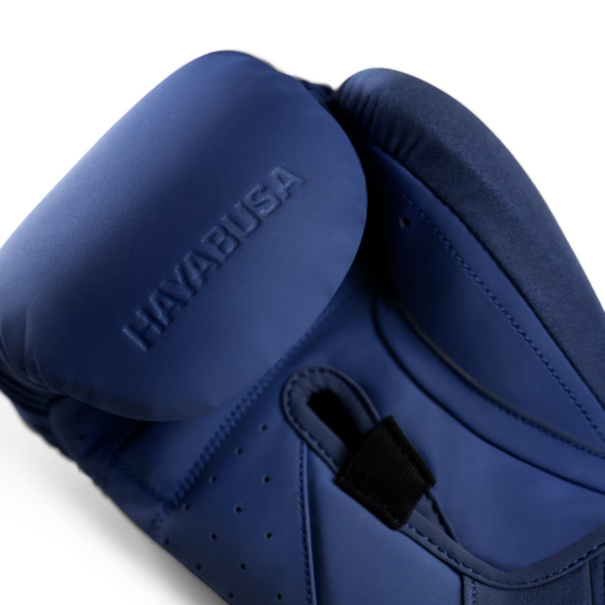 Détail du système de fermeture Dual-X sur les gants de boxe bleus Hayabusa T360