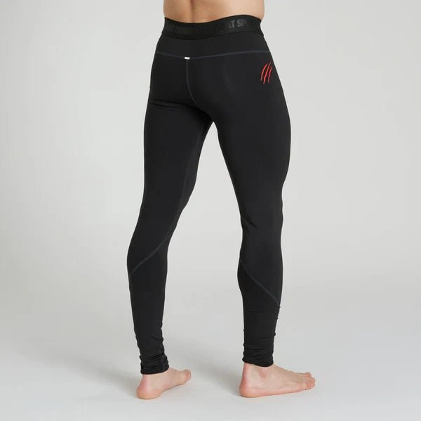 Vista traseira da legging Leone preta com detalhe de reforço