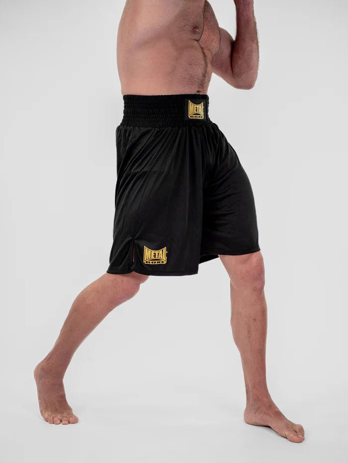 Detail of the silky fabric and finishes of the black Metal Boxe Water boxing shorts