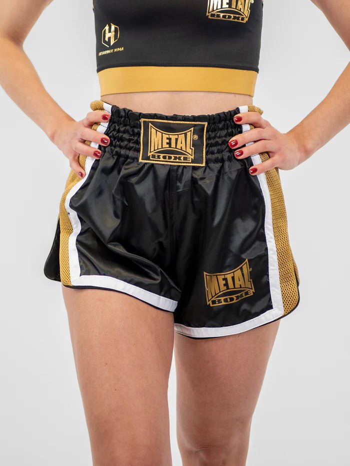 Pantaloni scurți Kickboxing pentru femei din vedere frontală Metal Boxe Extrem, auriu negru, scurtătură