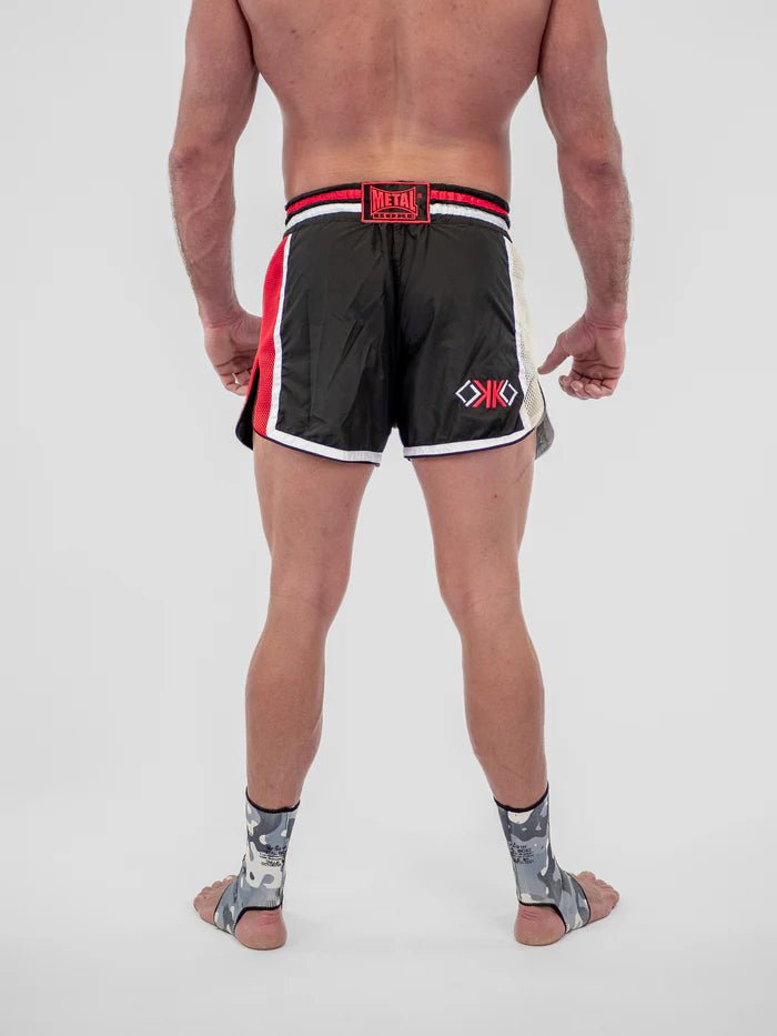 Detail of the OKO and Metal Boxe embroidery on the waistband of the fight shorts