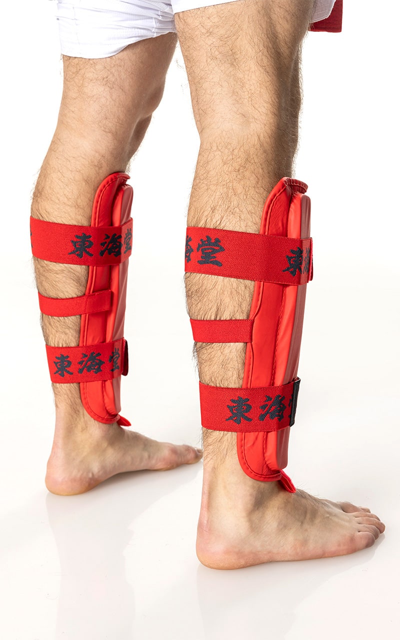 Protezione professionale per tibia Tokaido rossa senza parapiede per Kumite.