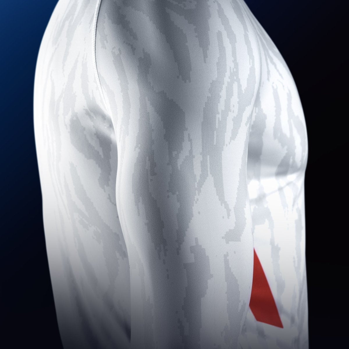 Detail of the sleeve of the white Hayabusa Apex rash guard, detail of the flatlock stitching