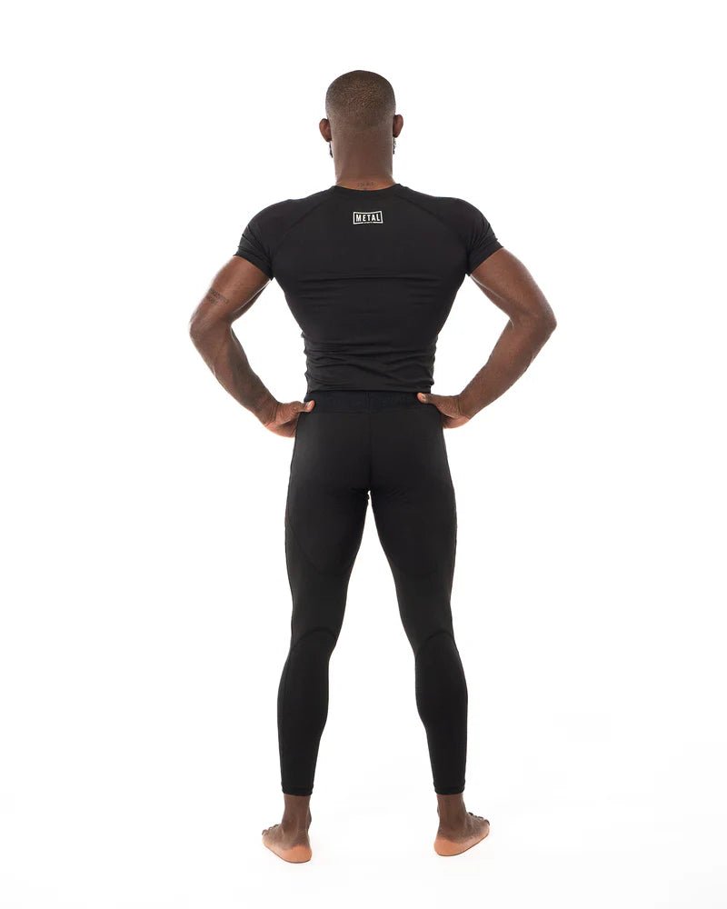 Rashguard vue arrière Metal Boxing noir maintien musculaire et liberté de mouvement