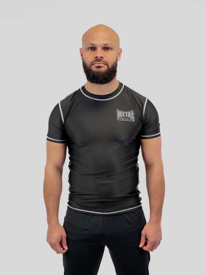 Hoofdvooraanzicht heren rashguard Metal Boxing zwart technisch compressieshirt
