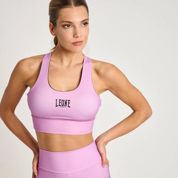 Pohled zepředu na technický sportovní top Leone Stripe 47 v růžové barvě s grafickými detaily