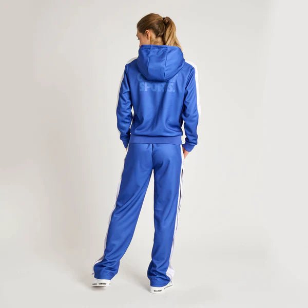 Rückansicht des blauen Leone Stripe Damenoveralls, der den modernen Schnitt hervorhebt