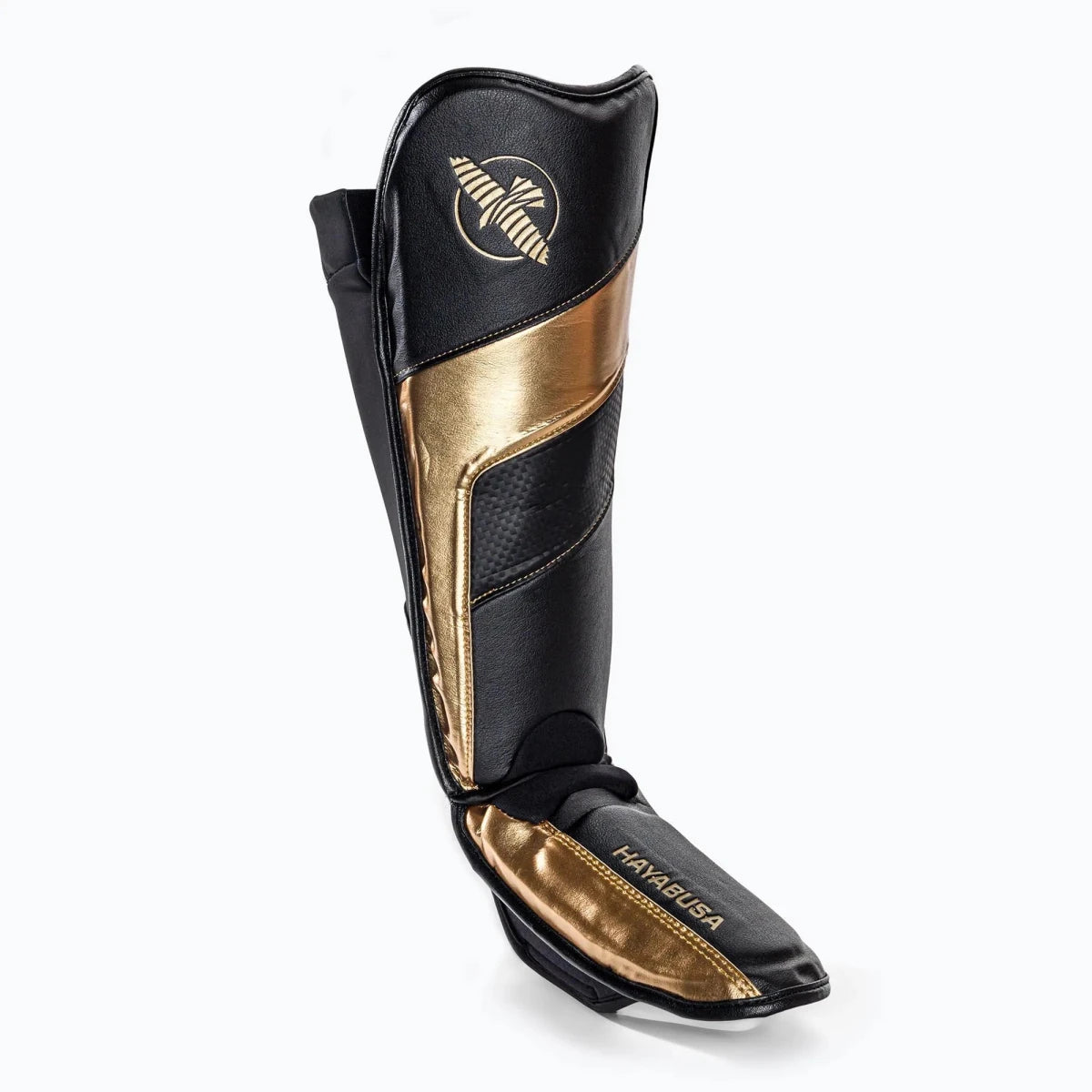Seitenansicht der schwarzgoldenen Hayabusa T3-Socken-Schienbeinschoner, die das schlanke und ergonomische Profil zeigen.